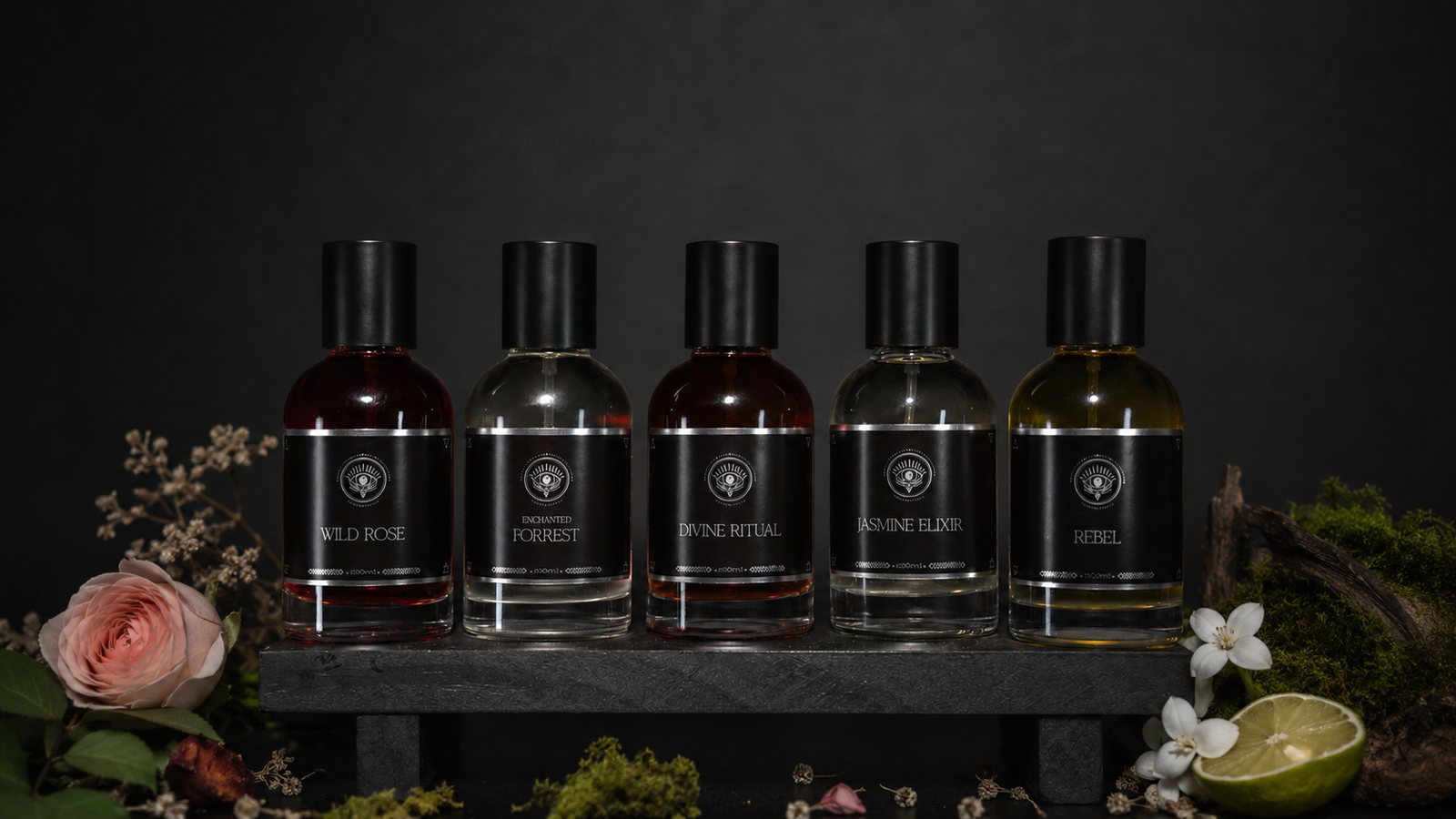 Soulchemy perfumes, five black bottles on dark backdrop with botanicals
