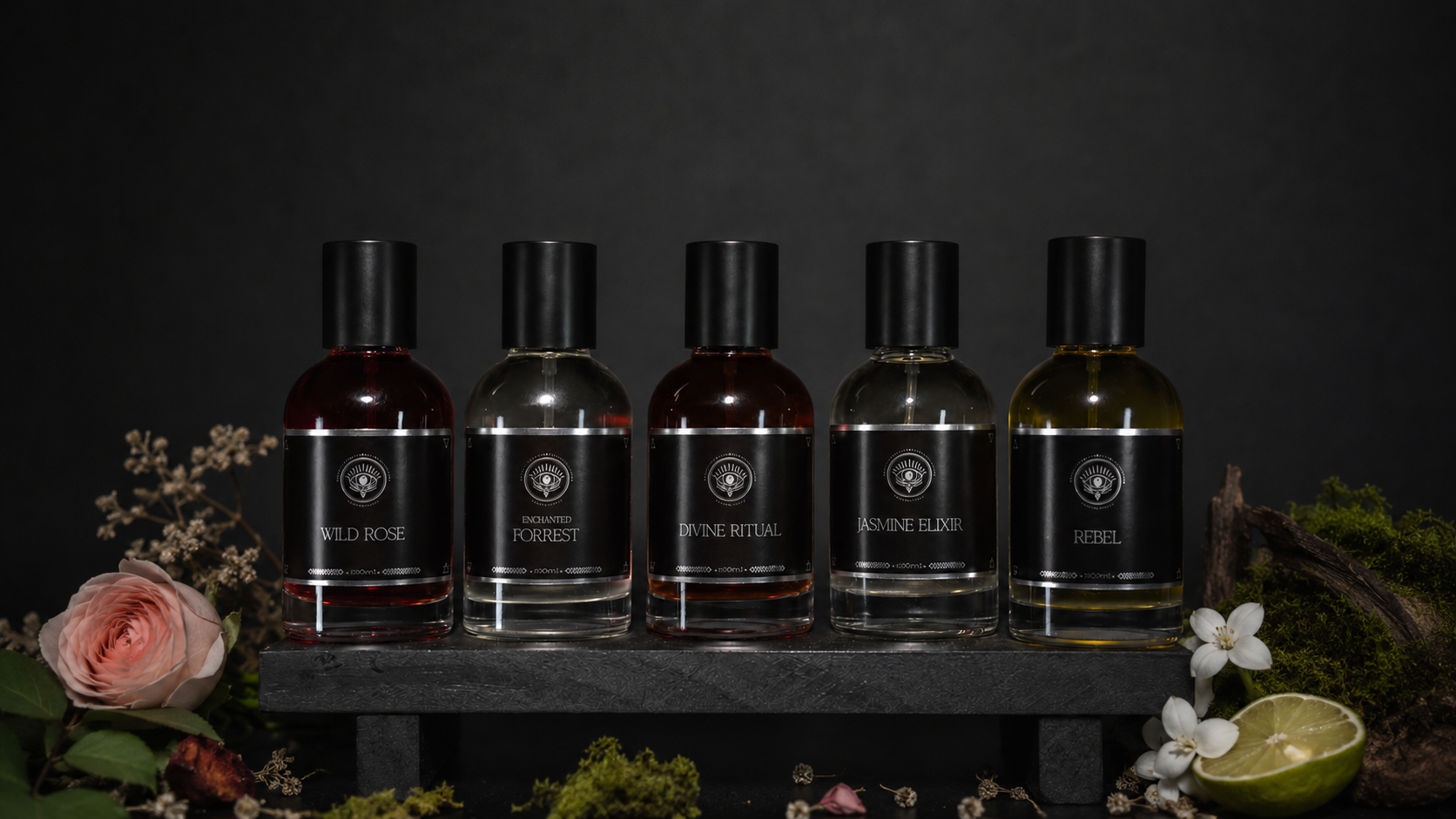 Soulchemy perfumes — five black bottles on dark backdrop with botanicals